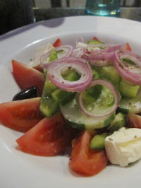 Salad using tomato, cucumber and fresh cheese